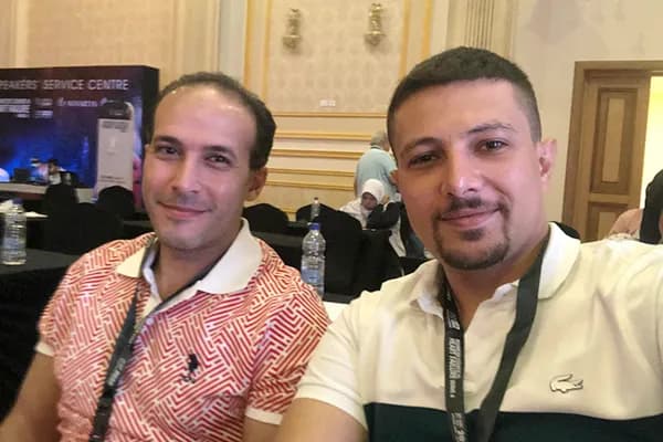 With a colleague at a medical conference