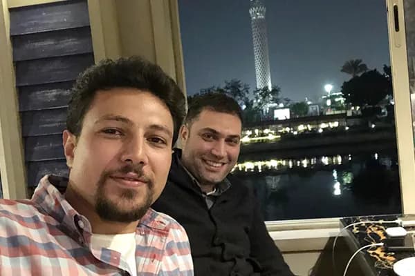 With a colleague by the Nile at night